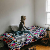 Therapy blanket and bedding set, colorful with leopard print.