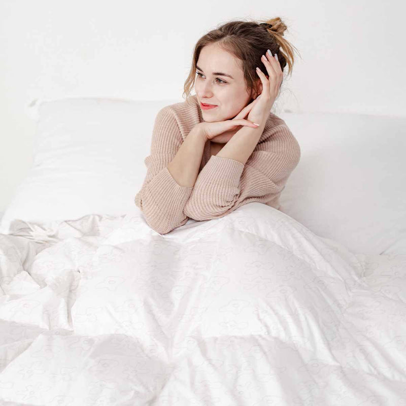 Therapy blanket and bedding set, white with delicate flowers.