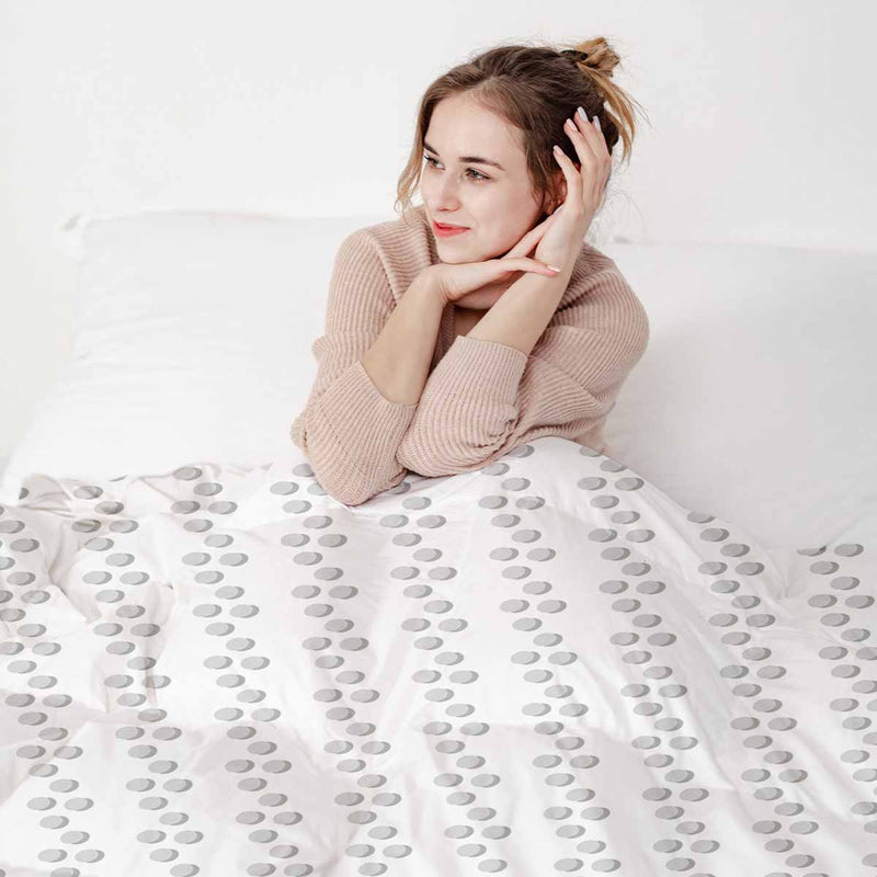 Therapy blanket and bedding set, white with grey circles.