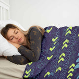 Therapy blanket and bedding set, dark blue with arrows.