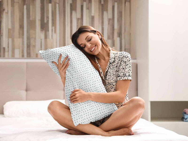 Health pillow, white with green crosses.