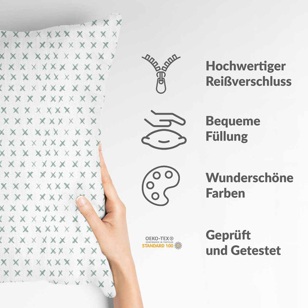 Health pillow, white with green crosses.