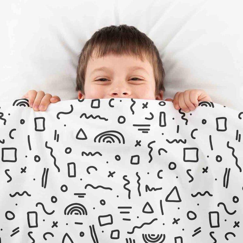 Juego de ropa de cama con mantas terapéuticas blanco con formas en negro