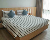 Therapy blanket bedding set, white with black stripes.