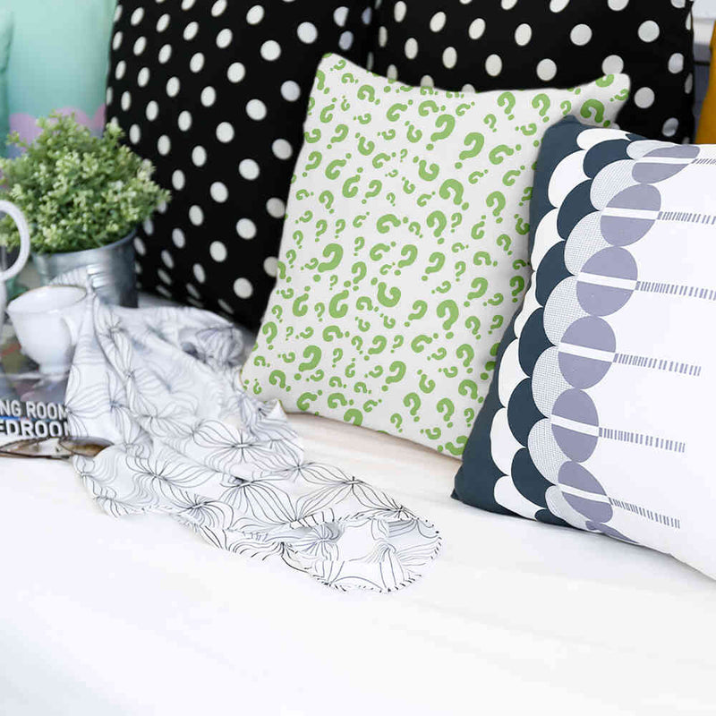 Health pillows with green question marks