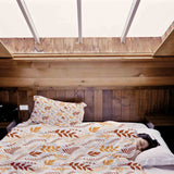 Therapy blankets and bedding set, white with autumnal branches.