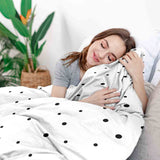 Therapy blanket and bedding set, white with scattered dots.