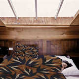 Therapy blanket and bedding set, brown with blue leaves.