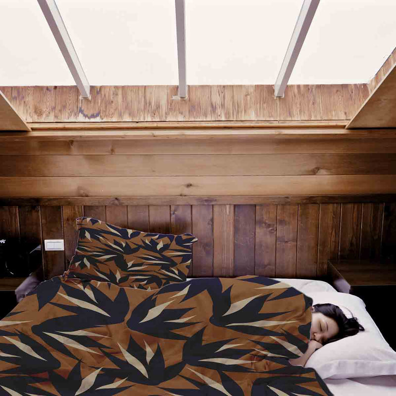 Therapy blanket and bedding set, brown with blue leaves.
