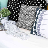Health pillow with the inscription "Joker" in black.