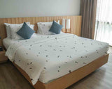 Therapy blanket and bedding set, white with black dandelions.
