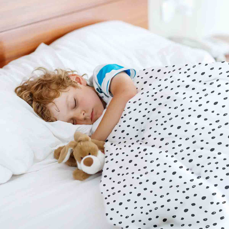 Therapy blanket and bedding set, white with many small dots.