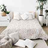 Set di biancheria da letto con coperte terapeutiche e delicati rami colorati
