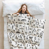 Juego de ropa de cama con mantas terapéuticas blanco con formas en negro