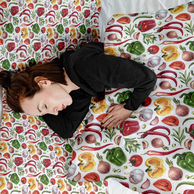 Set de ropa de cama con mantas terapéuticas y verduras