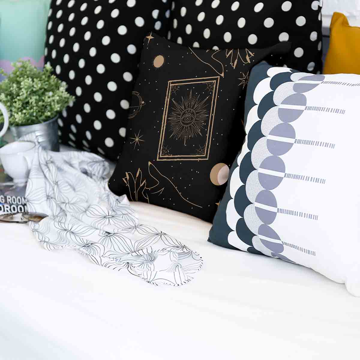 Cuscino sanitario nero con sole, luna e stelle