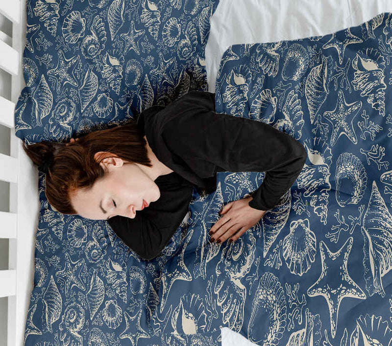 Therapy blanket and bedding set, blue with shells.