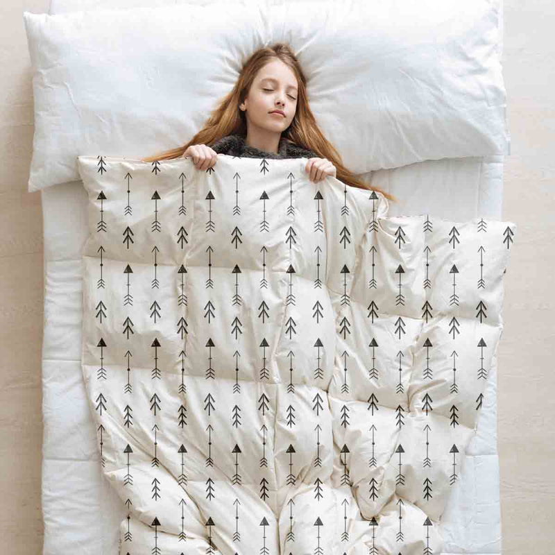 Therapy blanket and bedding set, white with many black arrows.