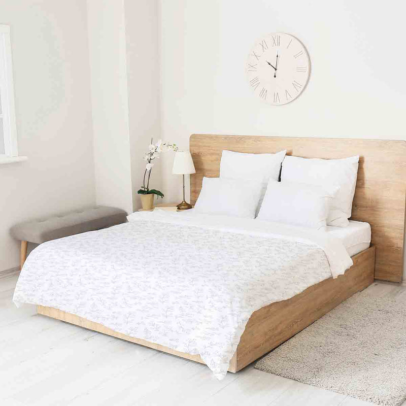 Therapy blanket and bedding set, white with delicate branches.