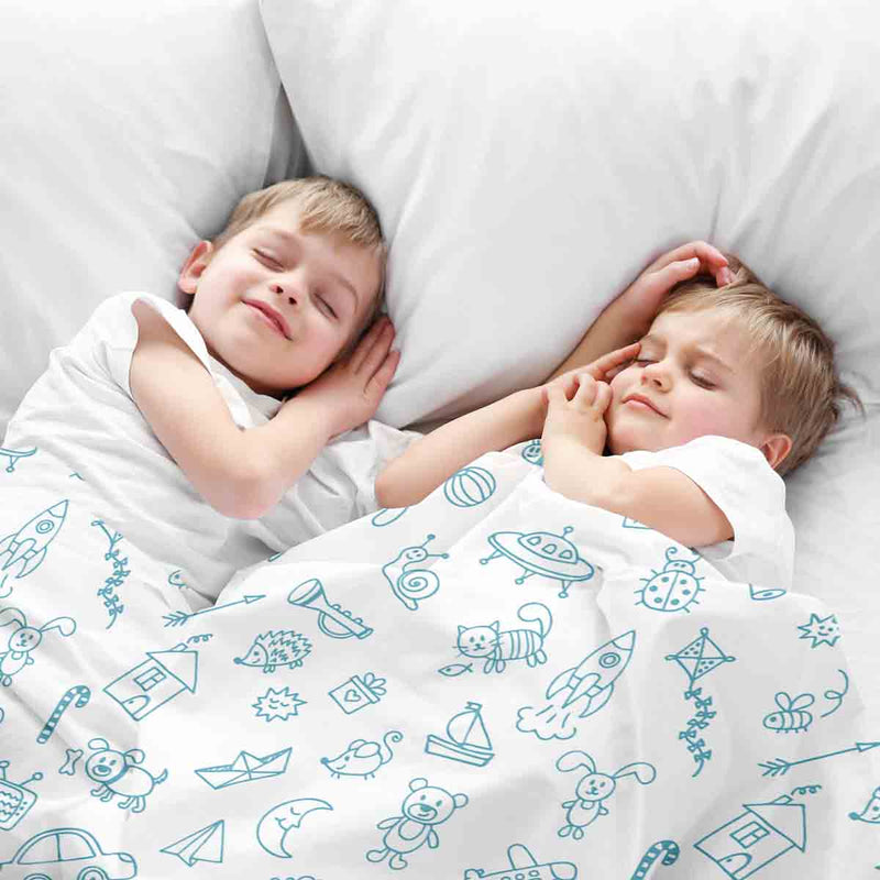Therapy blanket and bedding set, white, with toys.