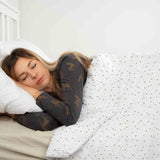Therapy blanket and bedding set, white with stars and dots.