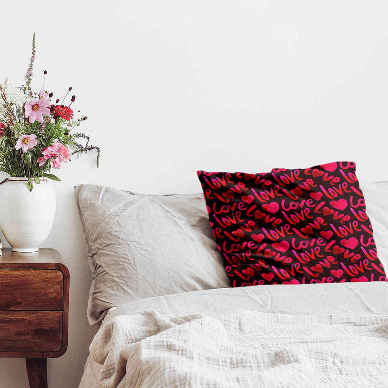 Health pillow, black with the word "Love"