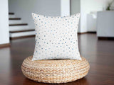 Cuscino sanitario bianco con piccole forme blu