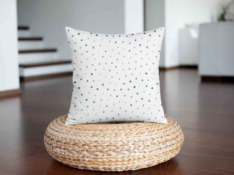 Cuscino sanitario bianco con piccole forme blu