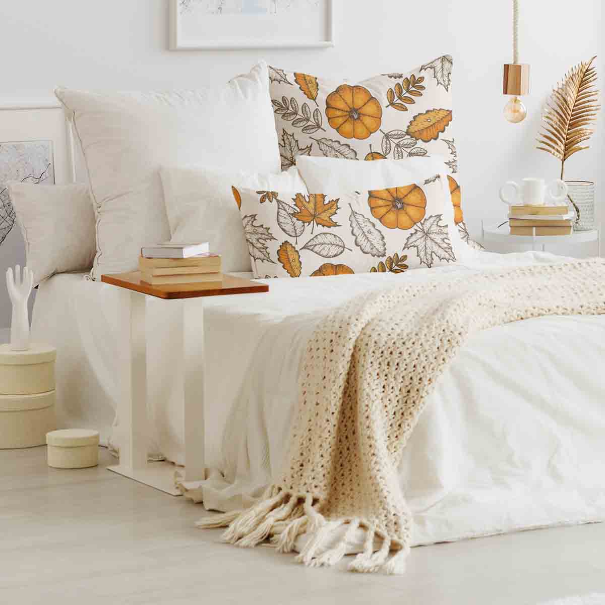 Cuscino sanitario bianco con foglia e zucca