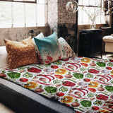 Set de ropa de cama con mantas terapéuticas y verduras