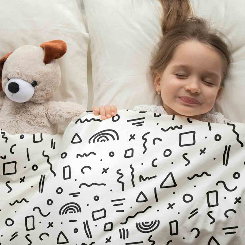Juego de ropa de cama con mantas terapéuticas blanco con formas en negro