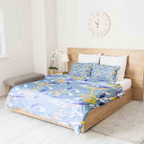 Therapy blanket and bedding set, blue with bouquet of flowers.