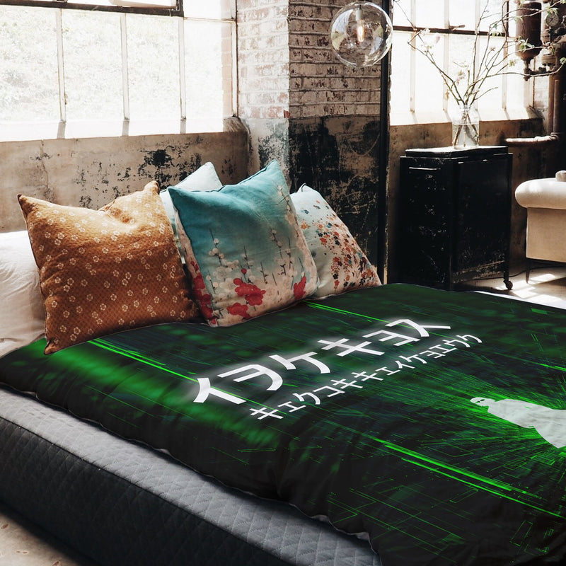 Therapy blanket and bedding set in green with lettering.