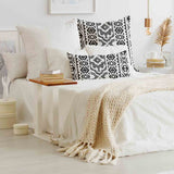 Health pillows with black shapes