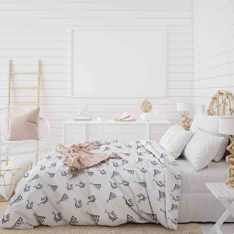 Therapy blanket bedding set, white, with boho earrings.