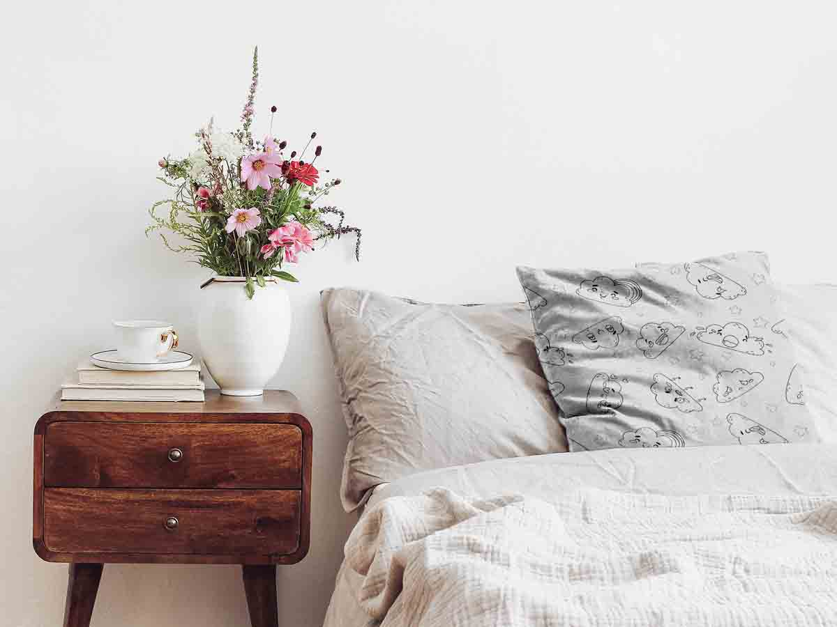 Health pillow white with funny clouds