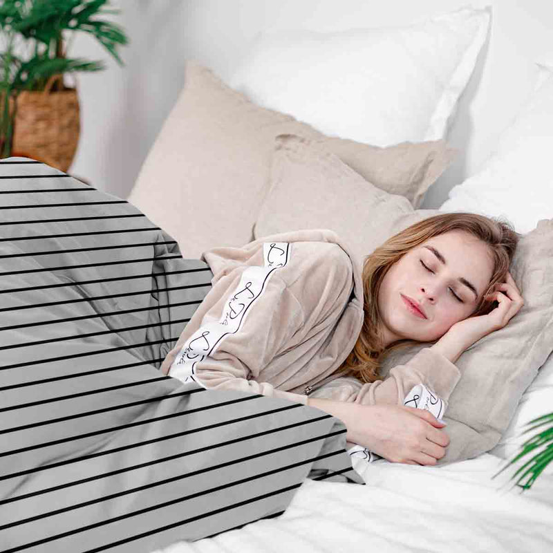 Therapy blanket bedding set, white with black stripes.