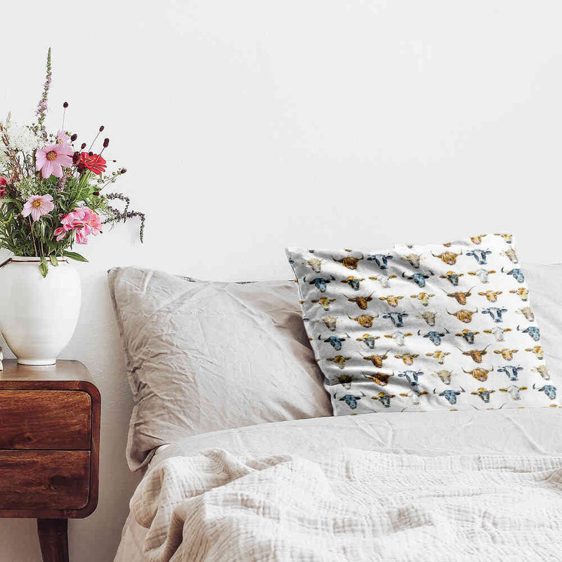 White health pillow with bull heads