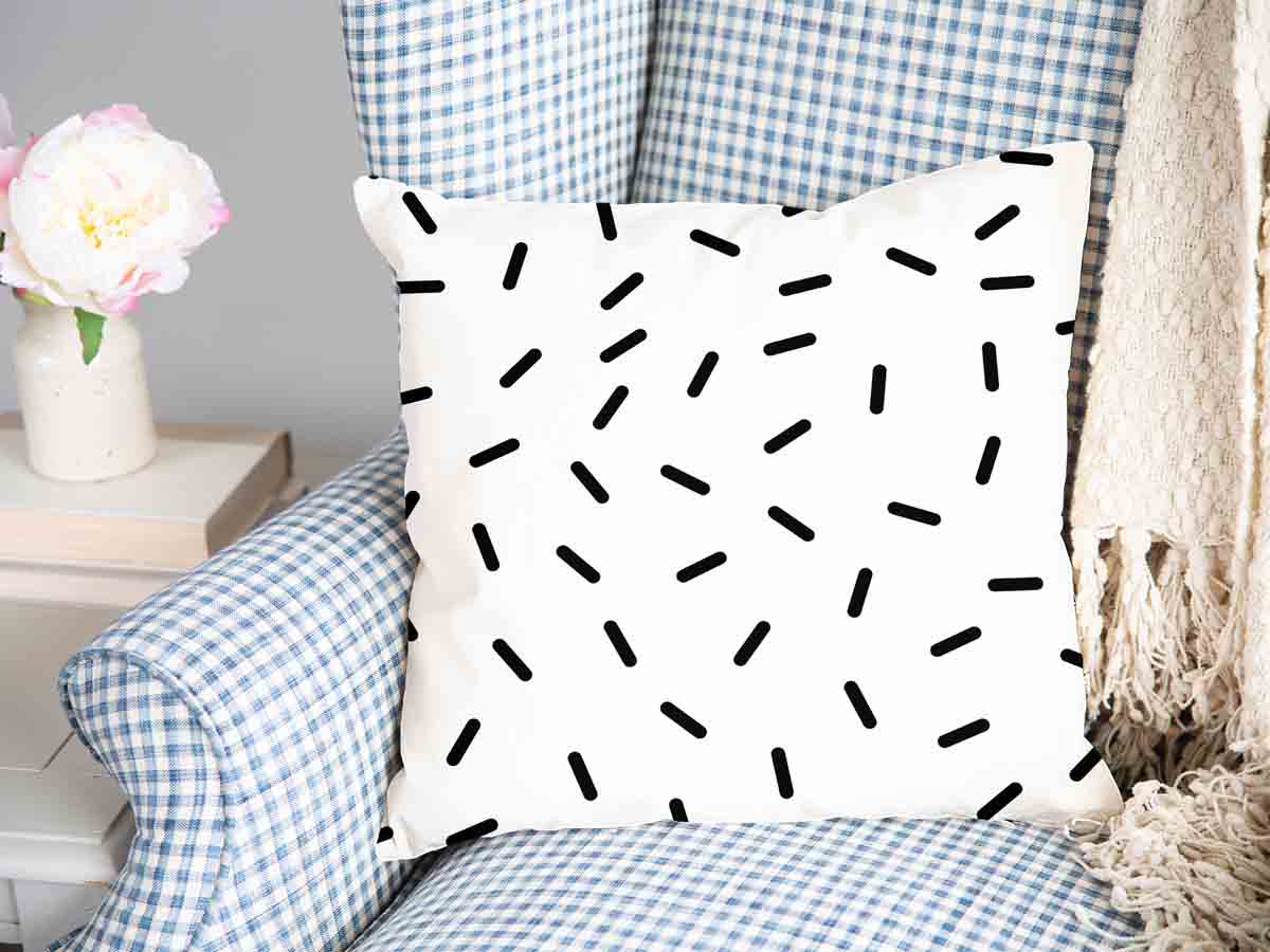 Almohada de salud blanca con rayas negras