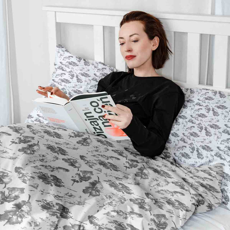 Therapy blanket and bedding set, white with grey leaves.