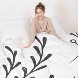 Therapy blanket bedding set, white with black branches.