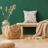 Almohada de salud blanca con ramas otoñales