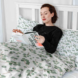 Therapy blanket bedding set, white with eucalyptus branches.