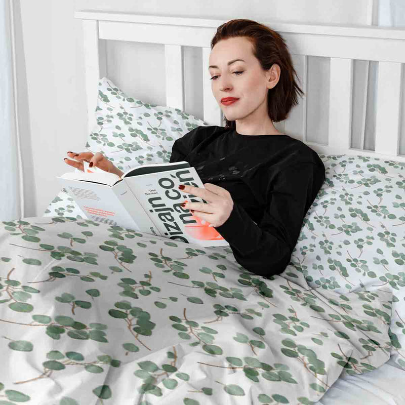 Therapy blanket bedding set, white with eucalyptus branches.