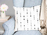 Almohada de salud blanca con puntos negros