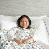 Set di biancheria da letto con coperte terapeutiche e dinosauri colorati