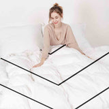 Therapy blanket bedding set, white with black zigzag pattern.