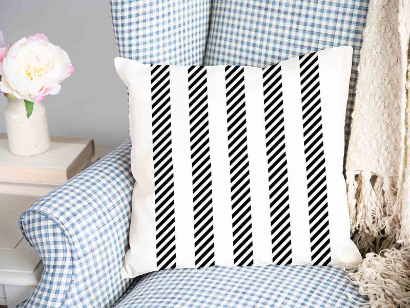 Health pillow, grey with thick and thin stripes.