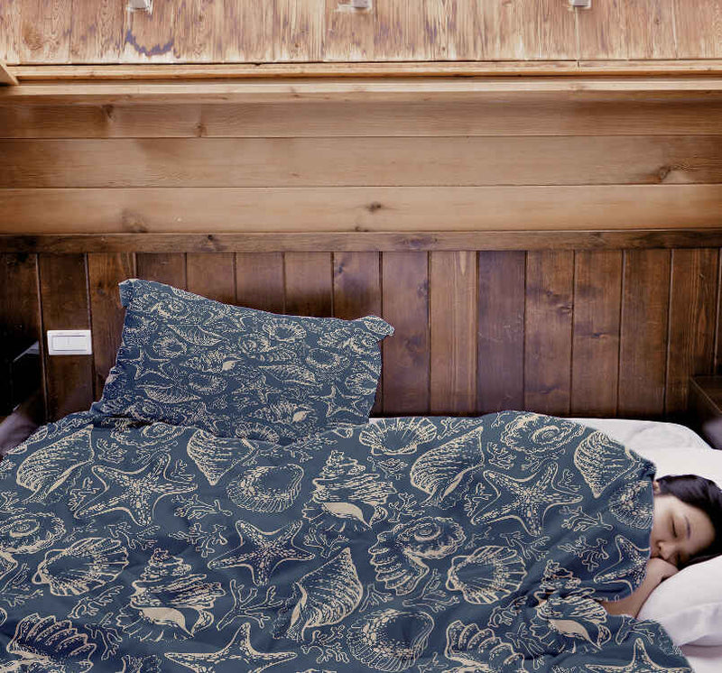 Therapy blanket and bedding set, blue with shells.