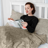 Therapy blanket bedding set, beige with black leaf pattern.